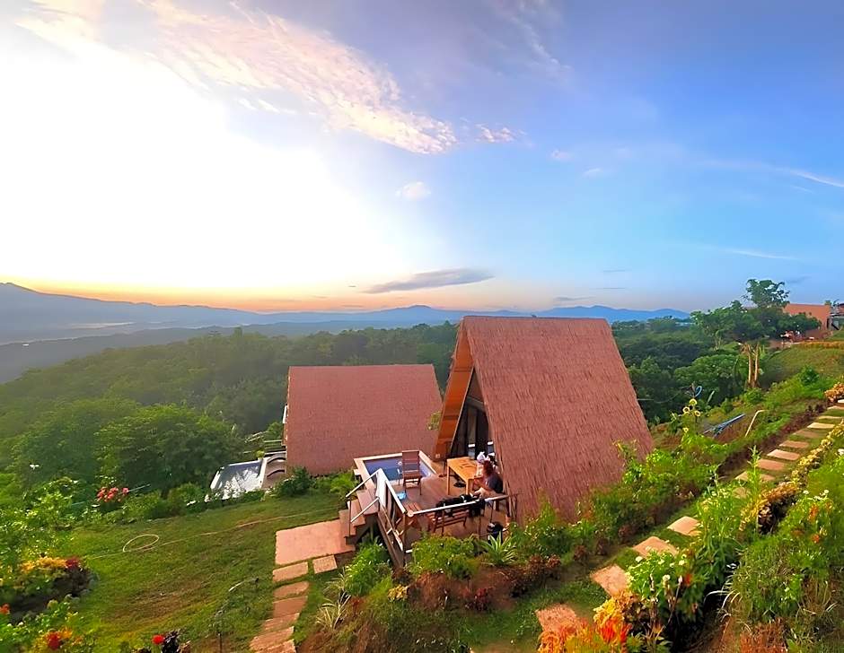 Farm Ridge by Desmond Farm — A DOT-recognized Farm Tourism Site at Km 3 Malbang, Pantabangan, with cabins and villas with private pools and a farm shop including local chocolate.